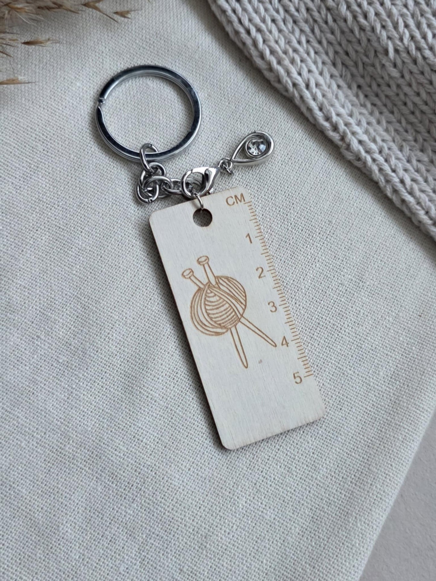 (NYHET) Nøkkelring med minilinjal og fremgangsmarkør